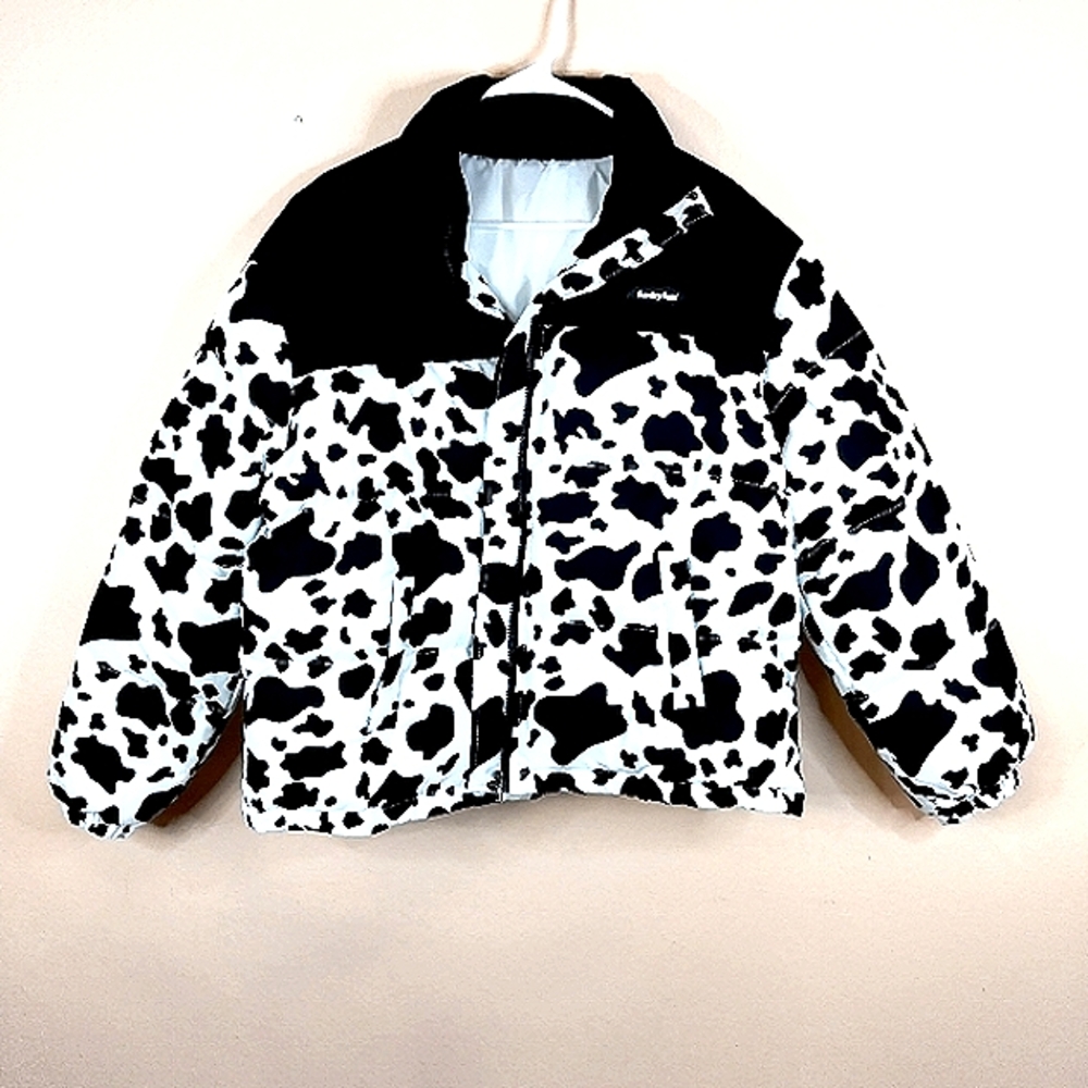 Fun Funky. New jacket no tags. Woman's cow print Black and White Large puffer.